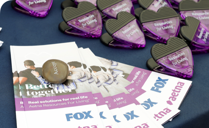 A spread of Fox Brochures and magnets that say Resources for Living